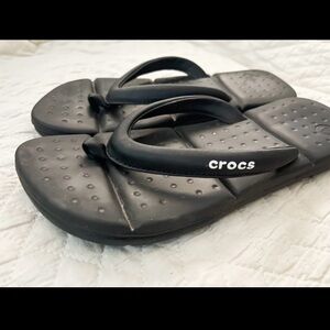 CROCS black flip flops size 6